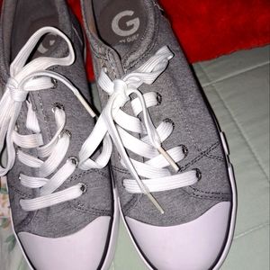 8 1/2 M Guess sneakers. Gray fabric with white shoe laces.